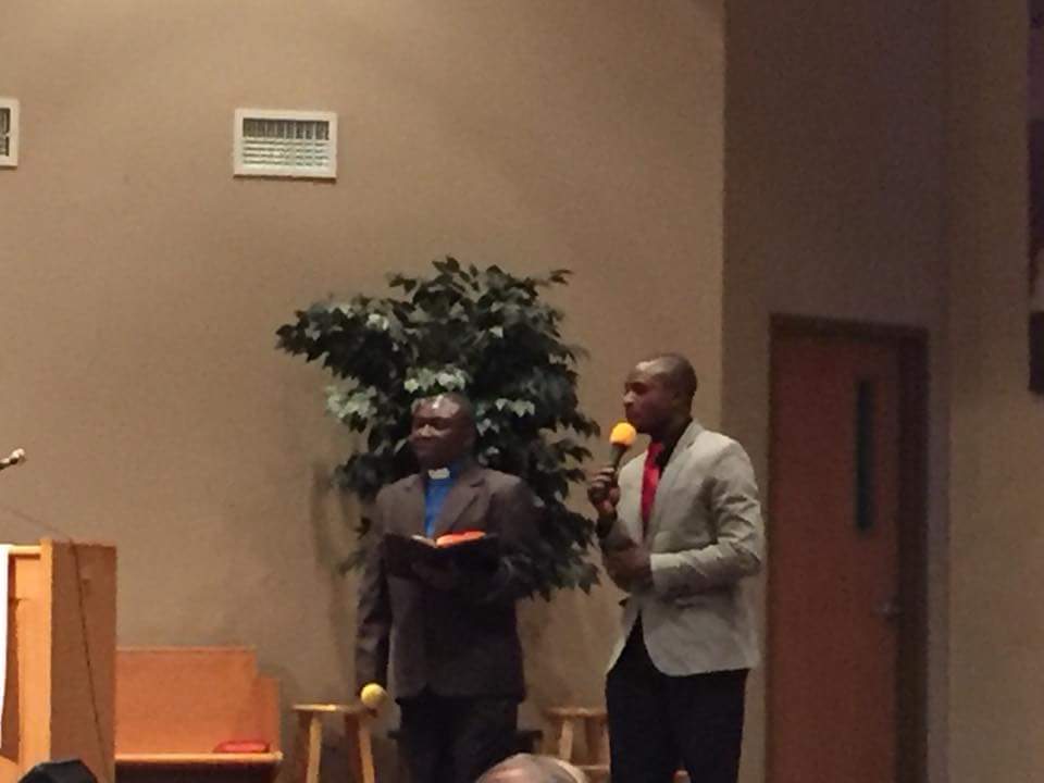 Pastor Fataki Mutambala giving the message, interpreted by Solomon.